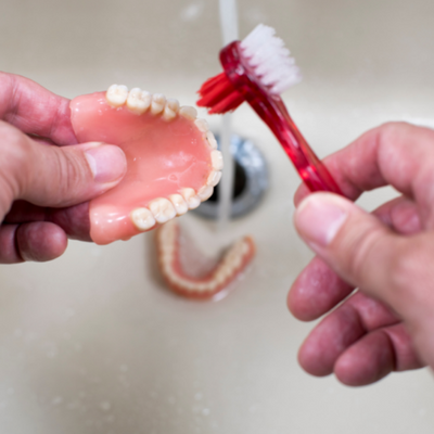 Clean Your Dentures for a Dazzling Smile!
